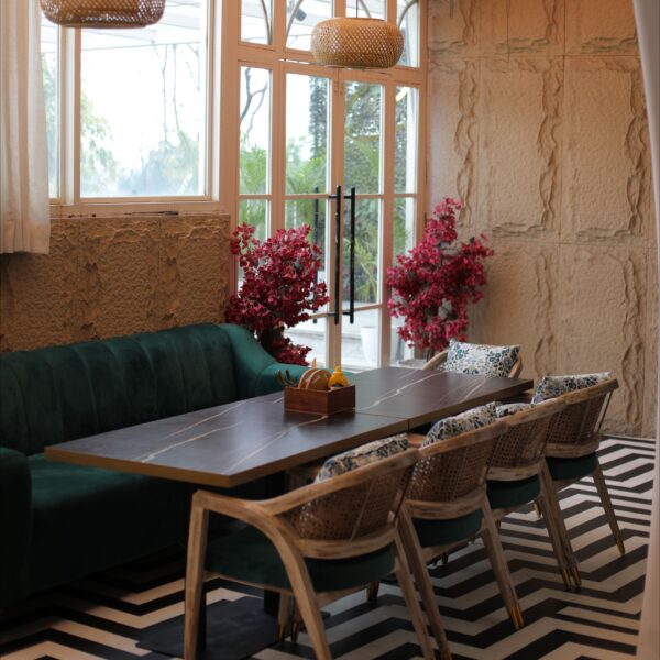 Elegant dining area with floral decor restaurant in delhi.