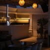 Elegant restaurant interior with warm lighting restaurant in delhi